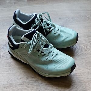 On Running Green and Black Athletic Shoes